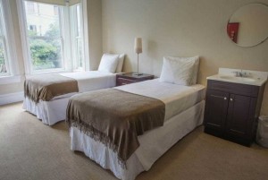 2 Twin Beds Shared Bathroom